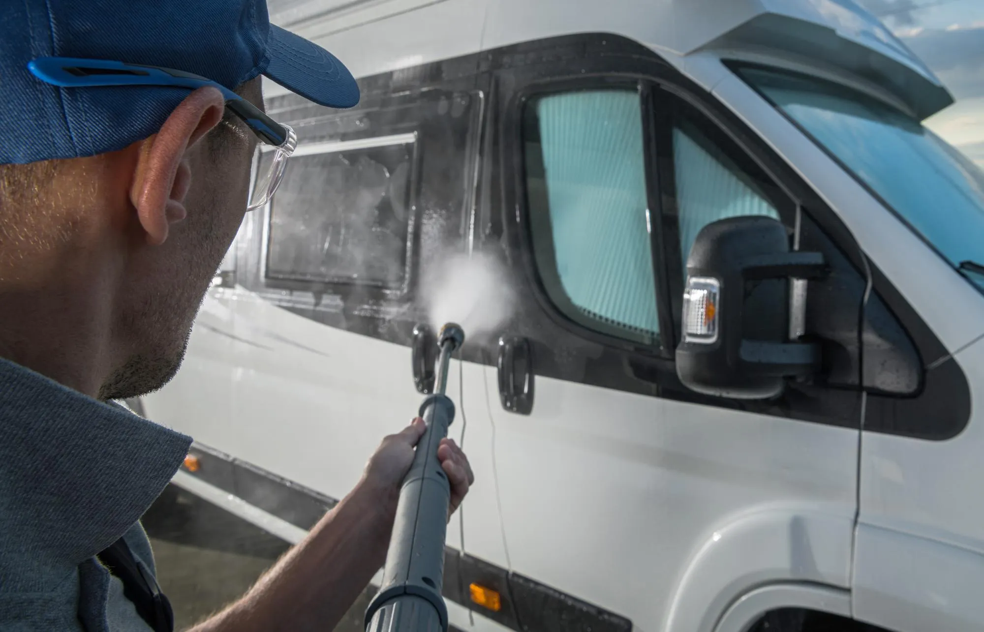 A clean truck fleet being washed with professional equipment.