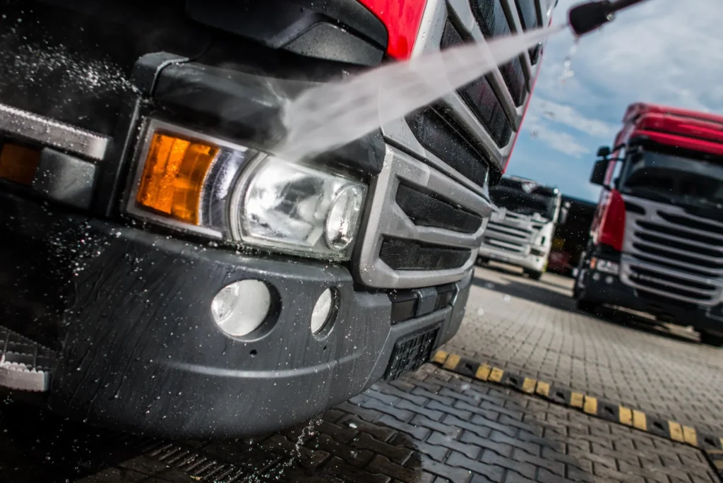 A lineup of clean trucks after receiving pressure washing services