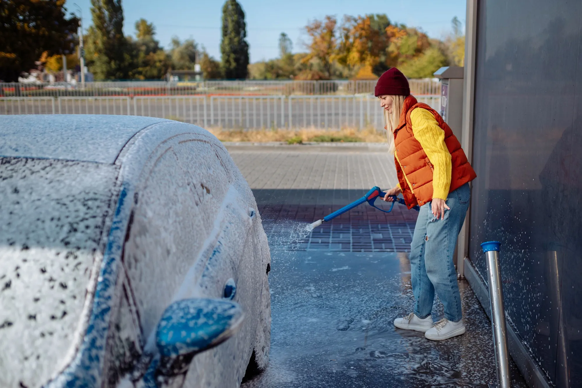 Professional cleaning an underground parking lot using eco-friendly methods.