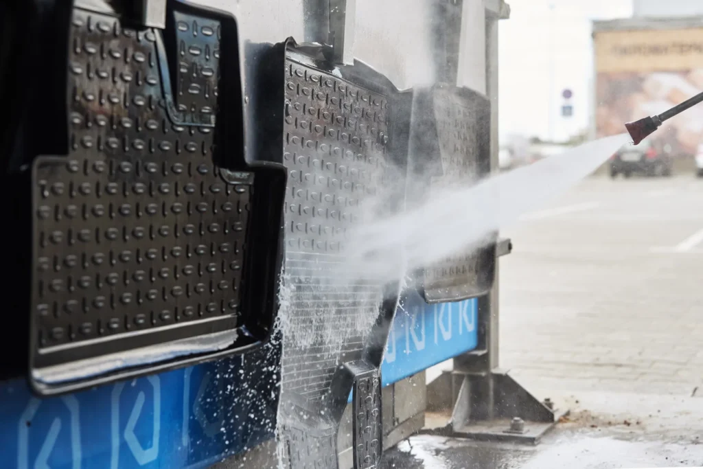 A side-by-side image showing fleet washing equipment and manual cleaning tools.